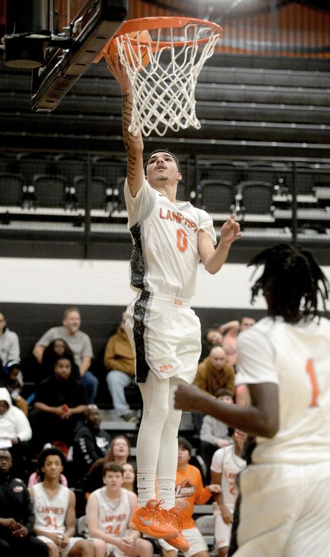 Soriano Hayes, seen getting to the rim earlier this month against Lincoln, had 26 points to lead Lanphier against Alton 52-50 on Monday, Jan. 19, 2026.