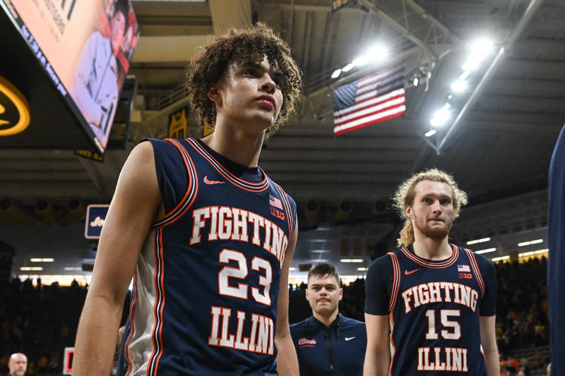 Jan 11, 2026; Iowa City, Iowa, USA; Illinois Fighting Illini guard Keaton Wagler (23) and forward Jake Davis (15) walk off the court after the game against the Iowa Hawkeyes at Carver-Hawkeye Arena. Mandatory Credit: Jeffrey Becker-Imagn Images