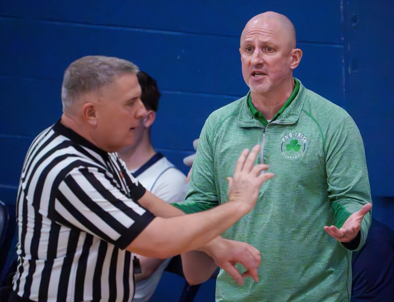 Peoria Notre Dame head coach Tom Lacher argues a call as the Irish battle Manual in the second half of their high school basketball game Tuesday, Jan. 13, 2026 at PND High School. The Rams defeated the Irish 70-53.