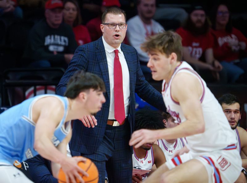 Bradley head coach Brian Wardle gives some in-game advice as the Braves battle Indiana State in the first half of their college basketball game Wednesday, Jan. 21, 2026 at Carver Arena. The Braves mounted a last-minute rally to defeat the Sycamores 75-68.