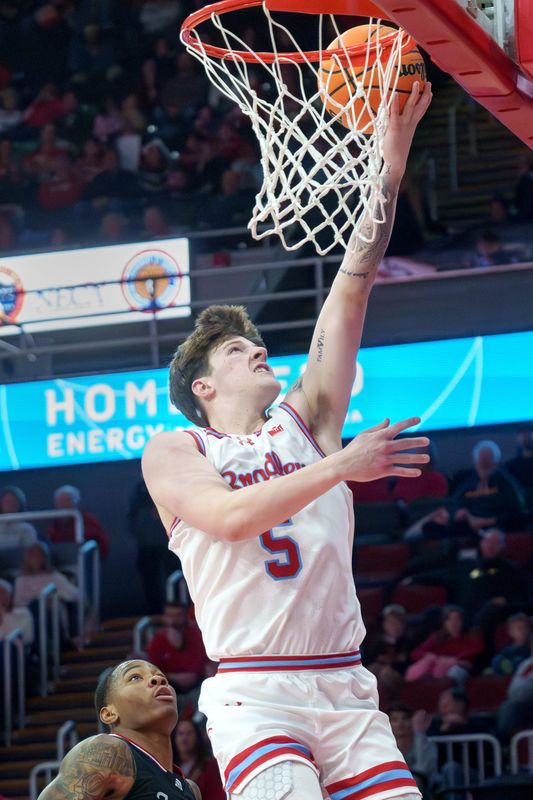 Bradley's Matthew Zobrist scores on UIC in the second half of their college basketball game Saturday, Jan. 24, 2026 at Carver Arena. The Braves fell to the Flames 85-70.
