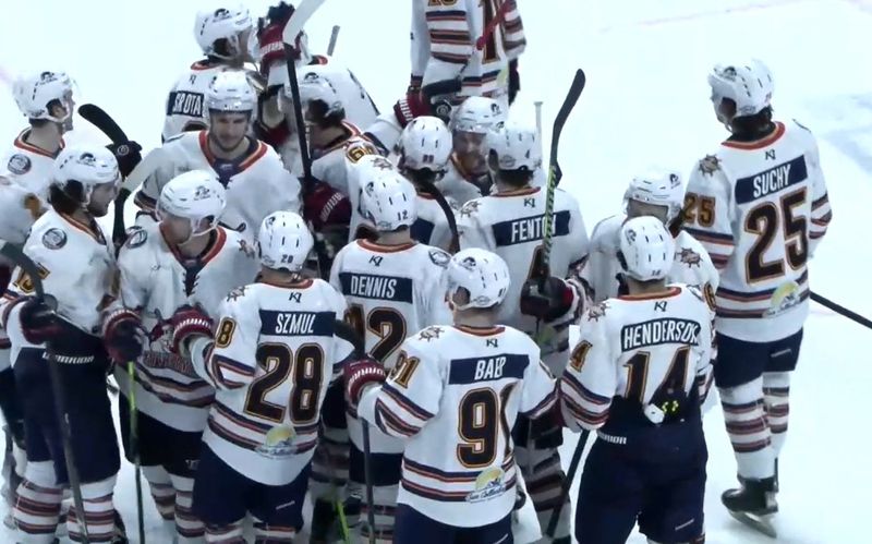 The Peoria Rivermen celebrate their 11th straight win, a 2-1 sudden-death shootout decision over Huntsville, at Propst Arena in an SPHL game Friday, Jan. 30, 2026 in Huntsville, Ala.