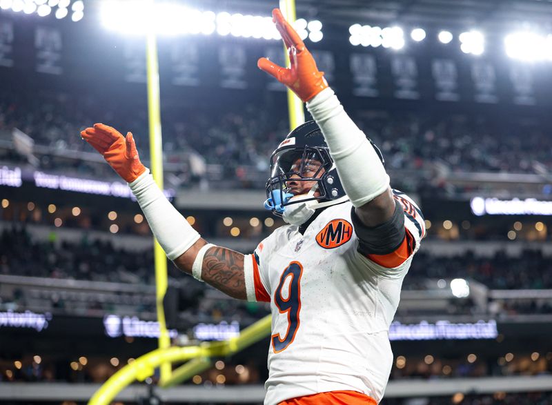 Nov 28, 2025; Philadelphia, Pennsylvania, USA; Chicago Bears safety Jaquan Brisker (9) reacts to a defensive stop against the Philadelphia Eagles at Lincoln Financial Field. Mandatory Credit: Bill Streicher-Imagn Images