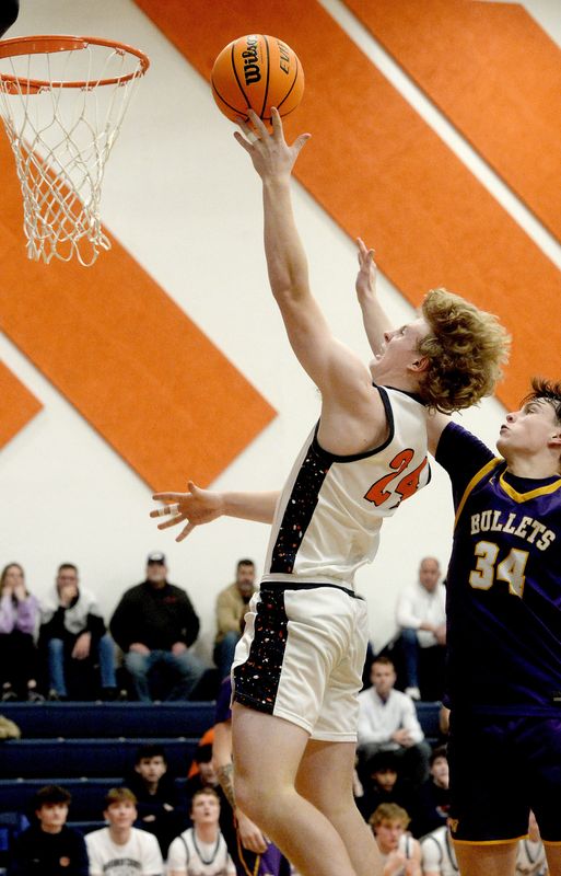 New Berlin's Reid Hepperly goes up for a basket during the game against Williamsville Tuesday, Feb. 17, 2026.