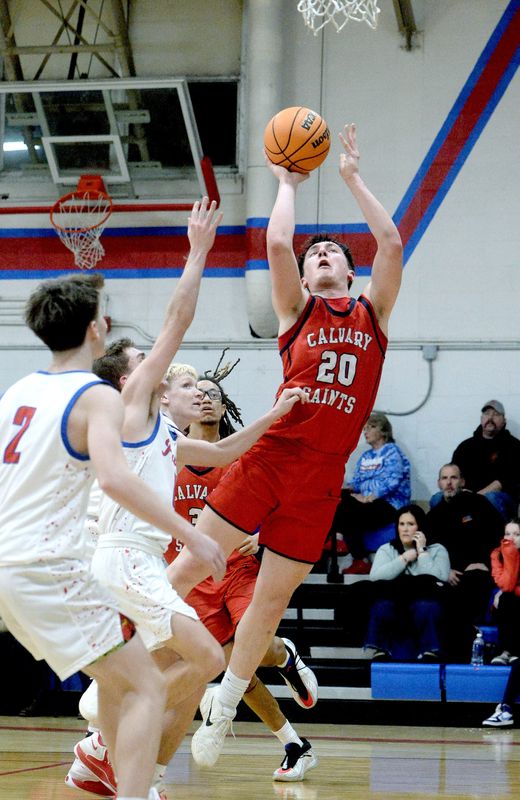 Calvary's Luke Blackford goes up for a basket during the game against Pawnee Friday, Feb. 20, 2026.