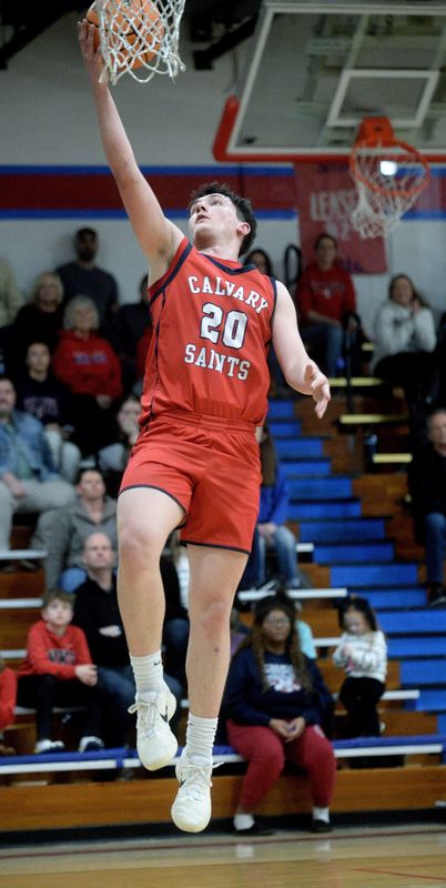 Calvary's Luke Blackford goes up for a basket during the game against Pawnee Friday, Feb. 20, 2026.