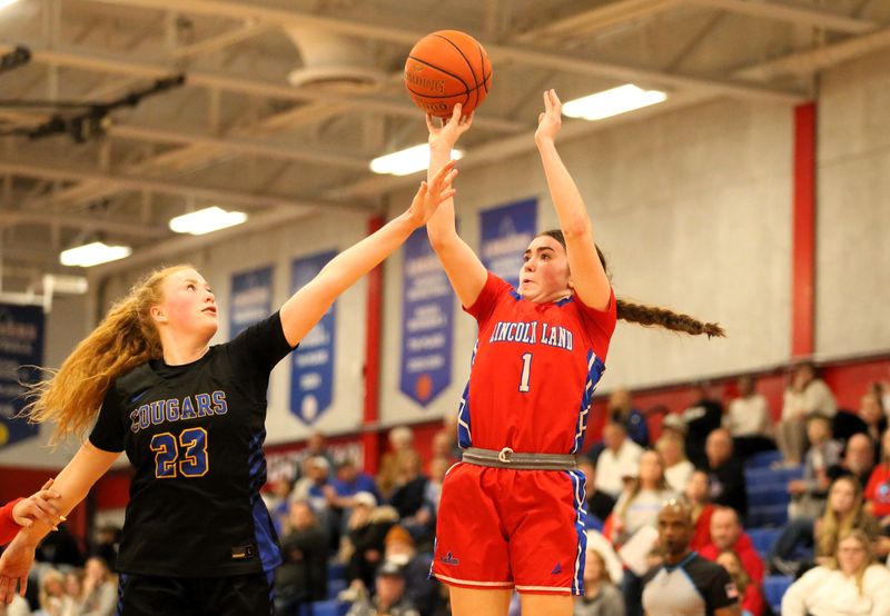 Lincoln Land Community College's Kylie Robinson converts a shot against Illinois Central College during an NJCAA Division II Region 24 women's basketball game at Cass Gymnasium on Saturday, Feb. 21, 2026. The freshman guard totaled 31 points in the 92-82 overtime loss.