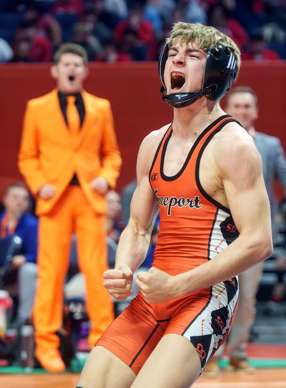 Freeport's Treyden Diduch celebrates his victory over Chatham Glenwood's Cooper Clarke in the 106-pound title match of the Class 2A state wrestling championships Saturday, Feb. 21, 2026 at the State Farm Center in Champaign.
