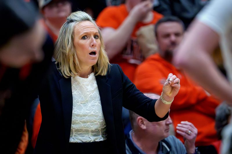 Washington head coach Kim Barth gives some instruction as the Panthers battle Galesburg in the second half of their Class 3A girls basketball sectional title game Thursday, Feb. 26, 2026 at Galesburg High School. The Panthers advanced to the supersectional with a 61-37 win.