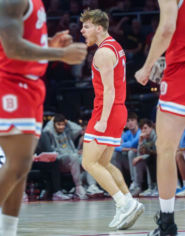 Bradley’s Alex Huibregtse celebrates one of his three-pointers against Murray State in the second half of their MVC college basketball game Sunday, March 1, 2026 at Carver Arena in Peoria. The Braves defeated the Racers 87-78.