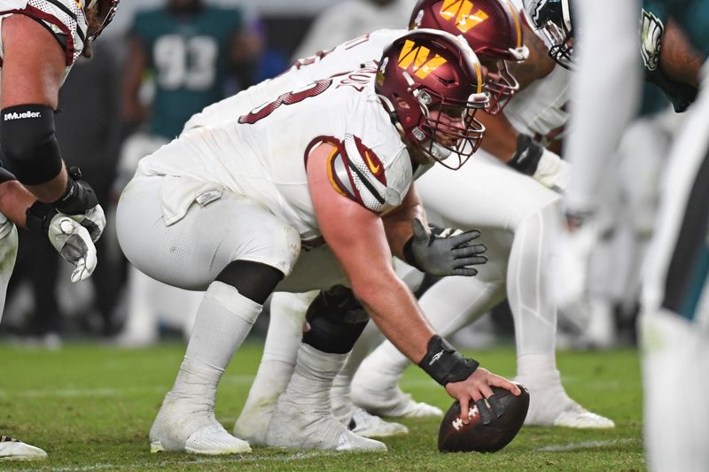 Nov 14, 2024; Philadelphia, Pennsylvania, USA; Washington Commanders center Tyler Biadasz (63) against the Philadelphia Eagles at Lincoln Financial Field. Mandatory Credit: Eric Hartline-Imagn Images