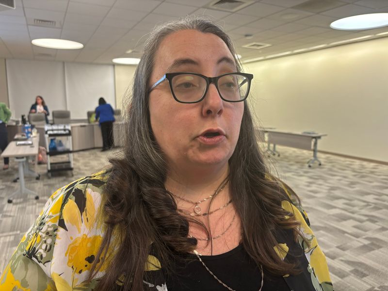 Springfield District 186 school board member Sarah Blissett addresses the media after the March 9, 2026, board meeting. The board voted in favor of a calendar with school year beginning Aug. 24, the day after the end of the Illinois State Fair.