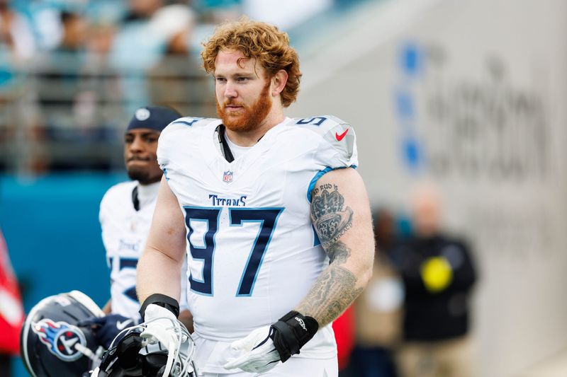 Jan 4, 2026; Jacksonville, Florida, USA; Tennessee Titans defensive lineman James Lynch (97) before the game against the Jacksonville Jaguars at EverBank Stadium. Mandatory Credit: Morgan Tencza-Imagn Images