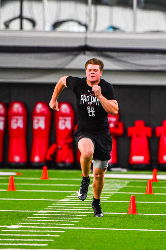 Long snapper Beau Gardner sprints the 40-yard dash at Georgia football's annual Pro Day in the House of Payne Indoor Facilities on Wednesday, March 18, 2026.