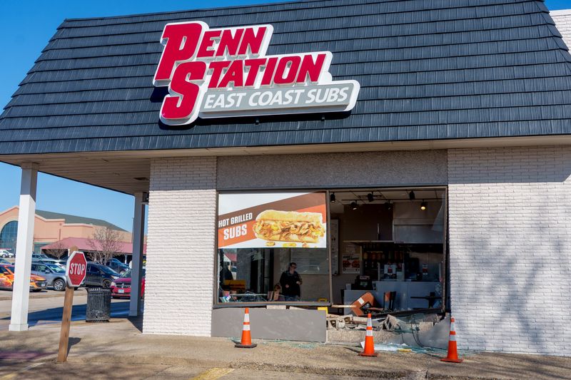 A truck crashed into the side of the Penn Station East Coast Subs restaurant Wednesday, March 18, 2026 at the Metro Centre in Peoria.