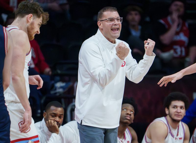 Bradley head coach Brian Wardle urges his team on in the first half of their first-round NIT game Wednesday, March 18, 2026 at Carver Arena in Peoria. The Braves were eliminated by the Dayton Flyers 80-66.