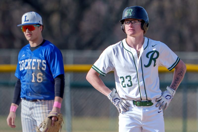 Richwoods’ Jarek Quinn (23) stands at second base after doubling against Limestone during their high school baseball game Monday, March 23, 2026 at Richwoods High School. The Rockets prevailed 4-3.