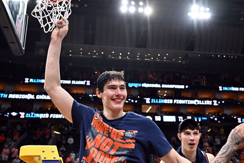 Illinois Fighting Illini guard Andrej Stojakovic (2) cuts the net after defeating the Iowa Hawkeyes in an Elite Eight game of the South Region of the men's 2026 NCAA Tournament at Toyota Center.