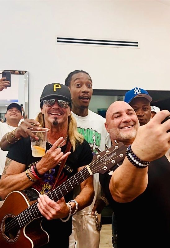 Bret Michaels (left), Wiz Khalifa and Jay Glazer hung at a recent party.