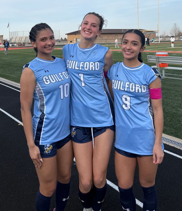 Azul Martinez (from left), Berkeley Stenstrom and Delilah Hawley pose for a photo early in the girls soccer season for Guilford.