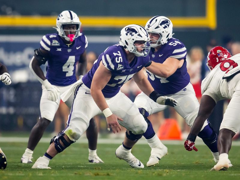 Dec 26, 2024; Phoenix, AZ, USA; Kansas State Wildcats offensive lineman Sam Hecht (75) against the Rutgers Scarlet Knights during the Rate Bowl at Chase Field. Mandatory Credit: Mark J. Rebilas-Imagn Images