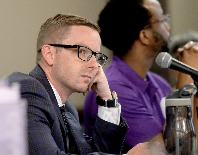 District 12 representative Marc Ayers attends the Sangamon County Board meeting in which a zoning vote would be made on the data centers at the Bank of Springfield Center Tuesday, April 7, 2026.