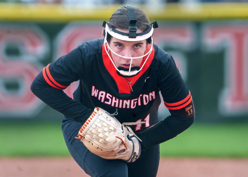 Washington pitcher Morgan Clarke shows some intensity as she prepares to throw against Metamora during their high school softball game Tuesday, April 7, 2026 in Metamora. The Panthers defeated the Redbirds 11-9.