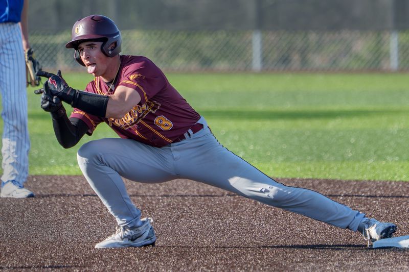 East Peoria’s R.J. Duncheon celebrates a double against Limestone during their high school baseball game Wednesday, April 8, 2026 at EastSide Centre in East Peoria. The Raiders routed the Rockets 12-2 in six innings.