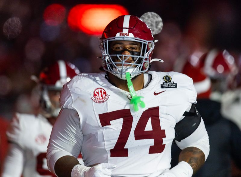 Alabama Crimson Tide offensive lineman Kadyn Proctor (74) against the Oklahoma Sooners during the CFP National Playoff First Round at Gaylord Family Oklahoma Memorial Stadium in Norman, Oklahoma on Dec. 19, 2025.