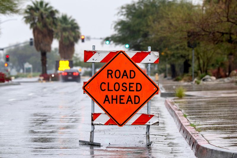 Palm Springs Police Department closed North Indian Canyon Drive at the wash just after 12:00 p.m. due to flash flooding in Palm Springs, California, on Dec. 24, 2025.