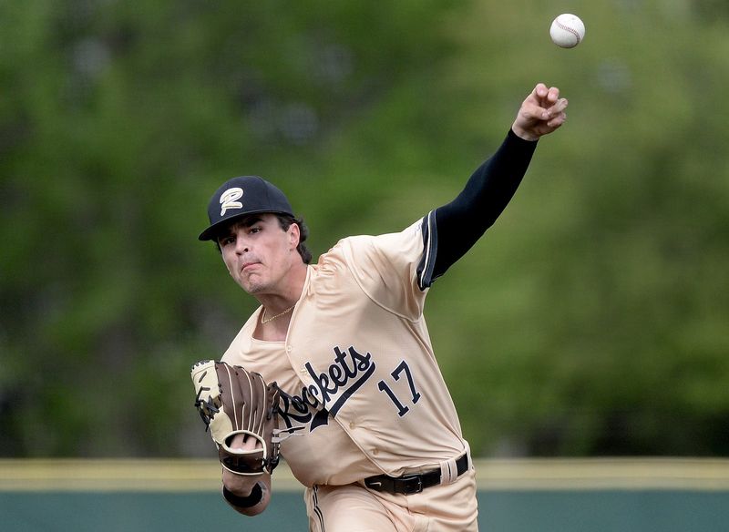 Jacksonville Routt pitcher Brady Turner delivers a pitch against Chatham Glenwood during the game Wednesday, April 15, 2026.