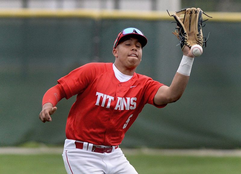 Chatham Glenwood right fielder Quinten Hale can't quite get to a pop up in foul territory against Jacksonville Routt Wednesday, April 15, 2026.