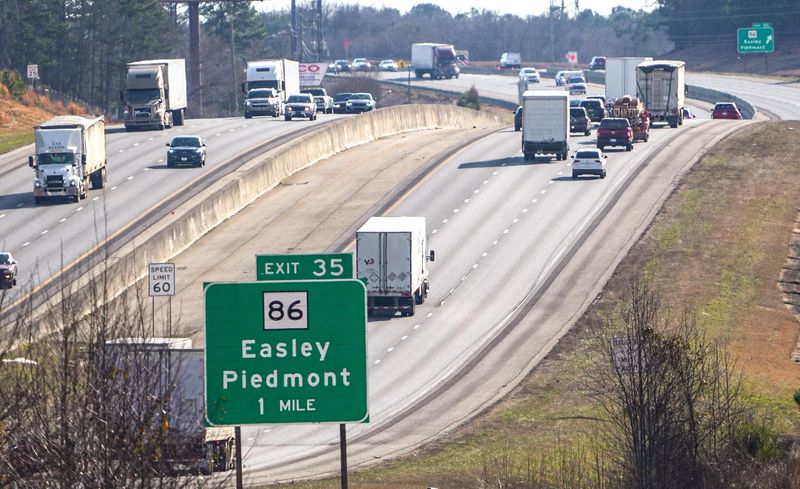 Cars and trucks travel toward Charlotte North and toward Atlanta going South on Interstate 85 in Feb. 2026, in Anderson County, SC.