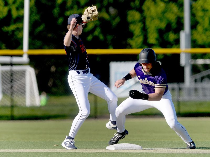 Sacred Heart-Griffin's Drew Ward steals second, but when Rochester's Adam Anderson was unable to make the catch Ward went onto third and would eventually steal home during the game Monday, April 20, 2026.