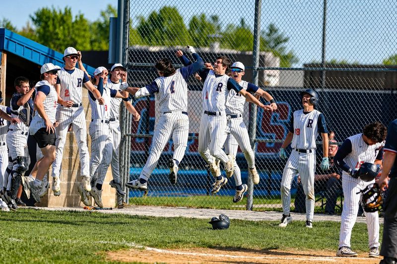 Rochester's dugout celebrates Sam Ferris' home run against Chatham Glenwood during a Central State Eight Conference baseball game on Tuesday, April 21, 2026.