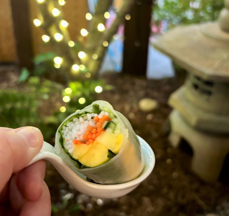 A Vietnamese summer roll with mango was served at a "White Lotus” themed party at Indochine restaurant, 7 Wayne Drive in Wilmington, N.C.