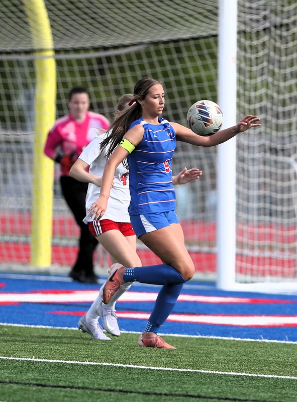 Pleasant Plains' Raelyn Brammer controls the ball against Springfield High in a nonconference girls soccer game on Friday, April 24, 2026.