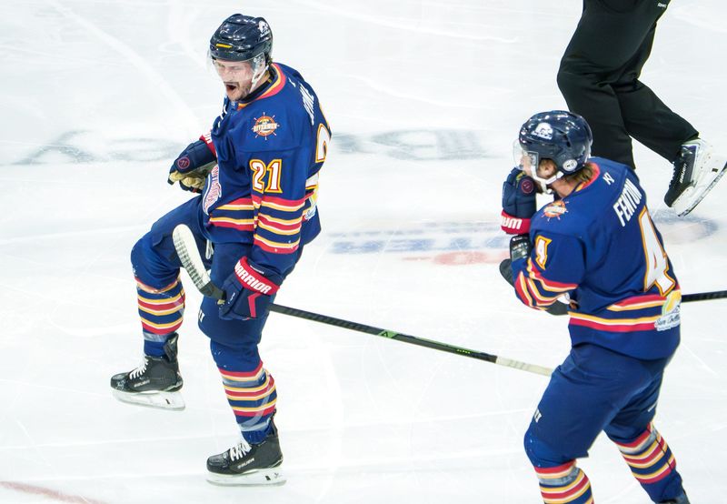 Peoria's Garrett Devine (21) celebrates his goal against Evansville in the first period of Game 2 of the SPHL President's Cup Finals on Friday, May 1, 2026 at Carver Arena.