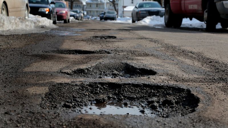 Potholes are scattered along Charest Street in Hamtramck in this file photo from 2015.