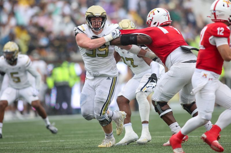 Sep 14, 2024; Atlanta, Georgia, USA; Georgia Tech Yellow Jackets defensive lineman Jordan van den Berg (99) rushes the passer against the Virginia Military Institute Keydets in the second quarter at Bobby Dodd Stadium at Hyundai Field. Mandatory Credit: Brett Davis-Imagn Images