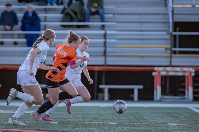 Harlem's Kendall Zanoni tries to break free during Boylan's late-season NIC-10 girls soccer victory over the Huskies on May 7, 2026, in Machesney Park.