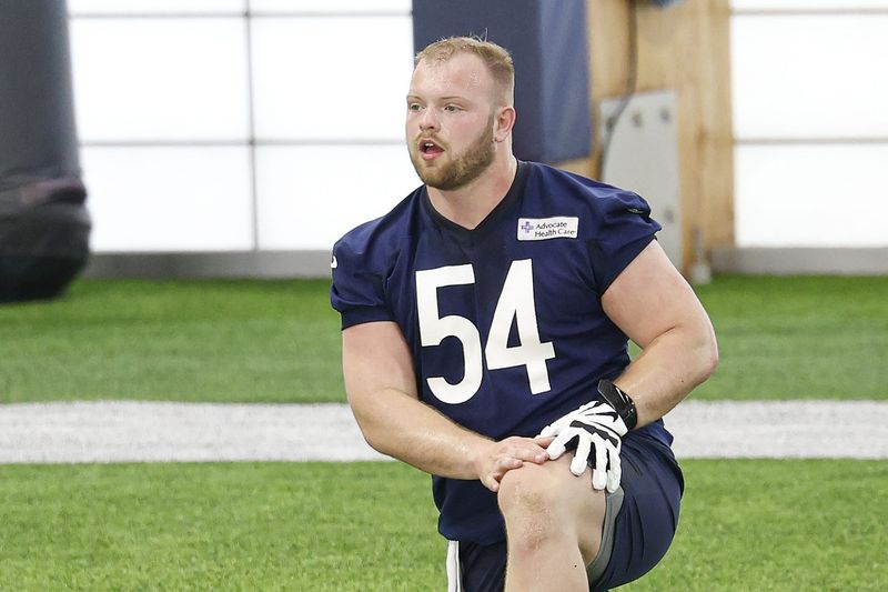 May 8, 2026; Lake Forest, IL, USA; Chicago Bears offensive lineman Logan Jones (54) stretches during Rookie Minicamp at Halas Hall. Mandatory Credit: Kamil Krzaczynski-Imagn Images