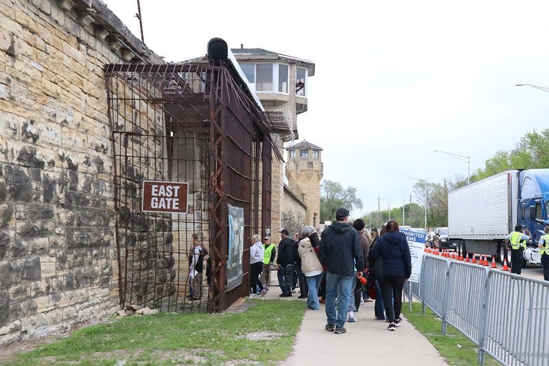 Attendees lined up outside the Old Joliet Prison during the Route 66 centennial kickoff game.