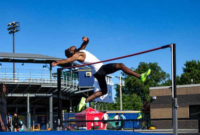 Chatham Glenwood's McKenzie Doe III clears the bar in the high jump during the Central State Eight Conference boys track and field meet at Memorial Stadium on Thursday, May 14, 2026.