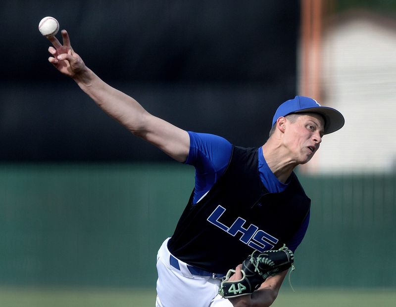 Lutheran High School's Caleb Cox pitches against Riverton during the game Thursday, May 21, 2026.