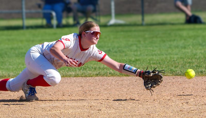 Brimfield shortstop Kendyl Binder dives for a Peoria Notre Dame hit up the middle during their Class 2A sectional softball semifinal Wednesday, May 27, 2026 in Brimfield. The Indians took out the Irish 6-1 to advance to the sectional title game.
