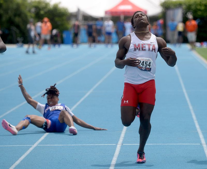 Metamora's Jaiduan Cranford runs in the 2A 100-meter dash during the IHSA boys track and field state championships at O'Brien Field in Charleston on Saturday, May 30, 2026.