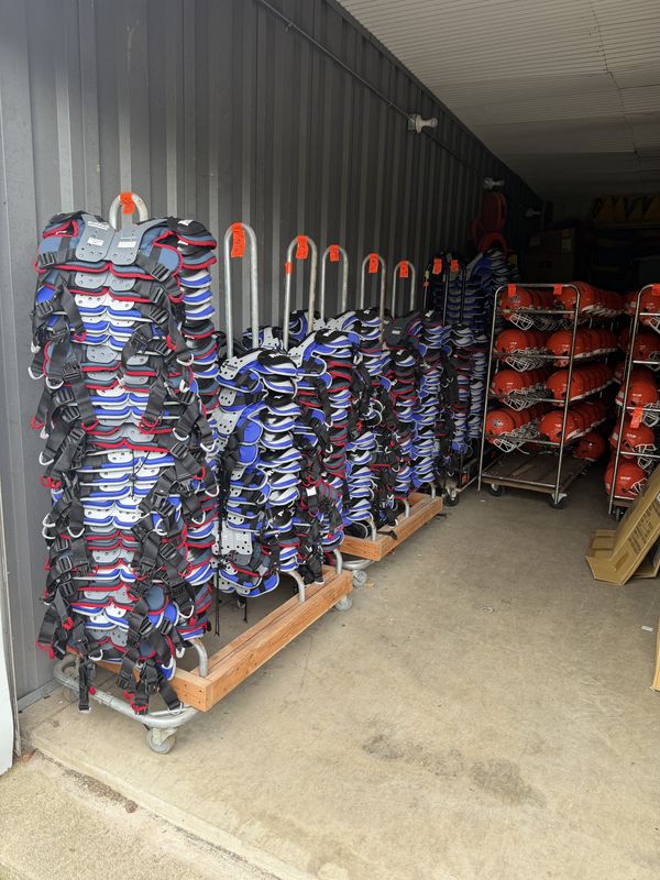 Equipment awaits in storage for the Washington Youth Football program, which has exited Peoria's JFLOCI and will compete in the Bloomington Area Football League in 2026.