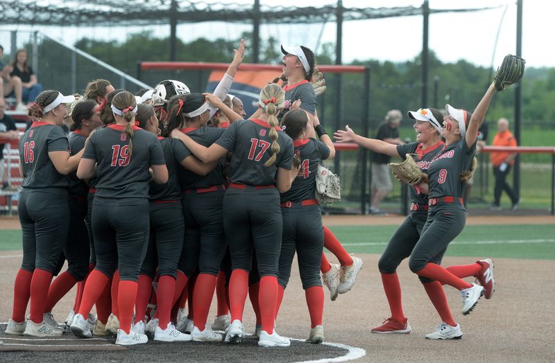 Glenwood players celebrate their victory over Fenwick during the Class 3A state semifinals in Peoria Friday, May 5, 2026.