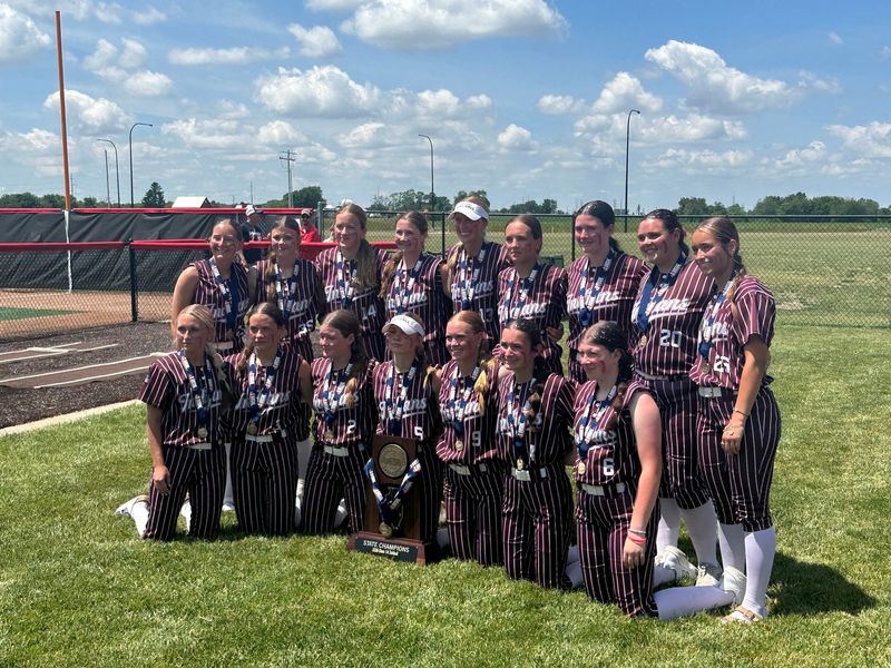 Dakota softball players take a team photo after their 2-1 comeback victory in the IHSA Class 1A state championship game on Saturday, June 6, 2026, in Peoria, Illinois. Dakota defeated Waltonville-Sesser-Valier for the title.